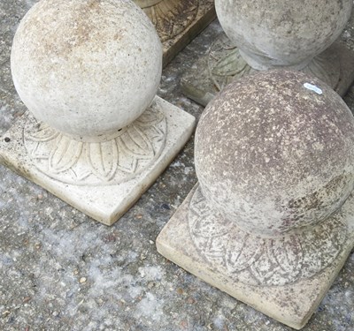 Lot 1 - A collection of five cast stone ball markers,...
