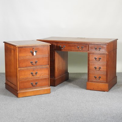 Lot 237 - A reproduction yew wood pedestal desk, with a...