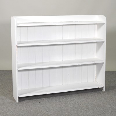 Lot 246 - A white painted pine dwarf open bookcase