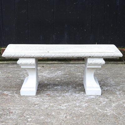 Lot 89 - A cast stone garden bench