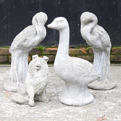 Lot 521 - A cast stone garden statue of a duck, 52cm...