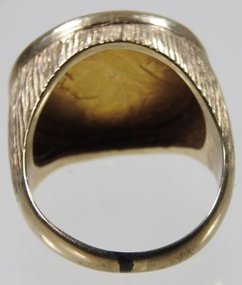 Lot 25 - A 9 carat gold ring, mounted with a Victorian...