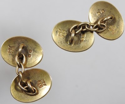 Lot 2 - A pair of 18 carat gold cufflinks, of oval...