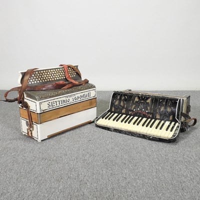 Lot 458 - A Boselli accordion, in a hard case, together...