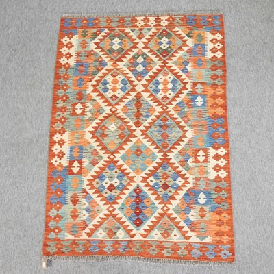 Lot 184 - A kelim rug