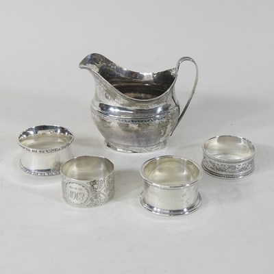 Lot 119 - A George III silver cream jug