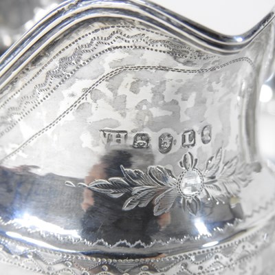 Lot 119 - A George III silver cream jug