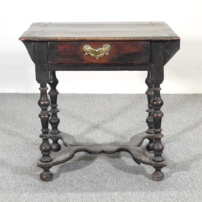 Lot 207 - An 18th century oak side table, with later...