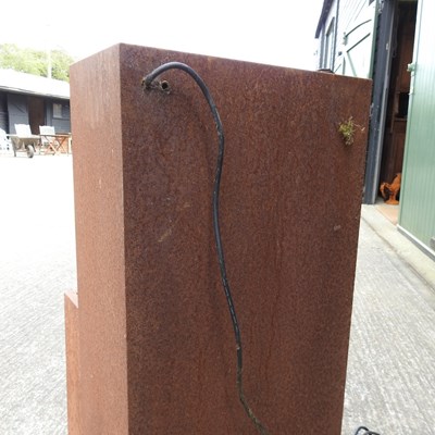 Lot 302 - A rusted metal garden water feature