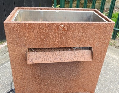 Lot 302 - A rusted metal garden water feature