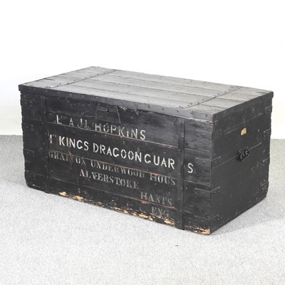 Lot 38 - A painted iron bound wooden military chest,...