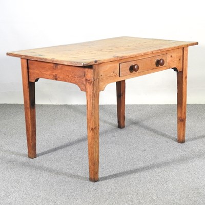 Lot 347 - An antique pine dining table, containing a...