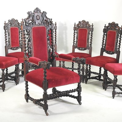 Lot 312 - A set of seven 19th century heavily carved oak dining chairs