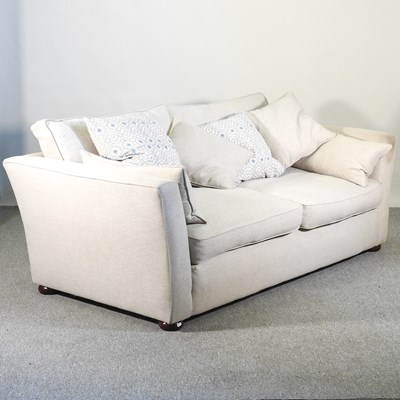 Lot 150 - A modern cream upholstered sofa, with loose...