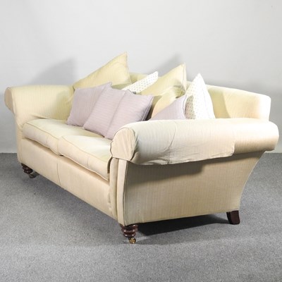 Lot 212 - A modern cream upholstered Duresta sofa, on...