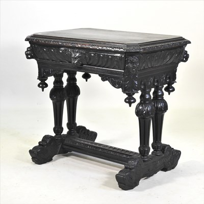 Lot 208 - A 19th century heavily carved dark oak side table