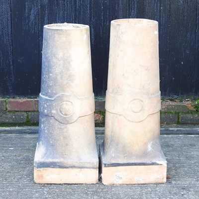 Lot 388 - A pair of chimney pots, highest 74cm (2)