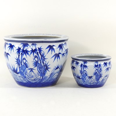 Lot 617 - A pair of Chinese blue and white graduated...