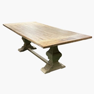 Lot 510 - A limed elm refectory dining table, on...