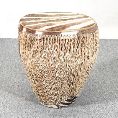 Lot 255 - An African zebra skin drum, 46cm high