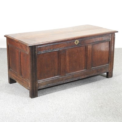 Lot 132 - An 18th century oak coffer, of panelled...