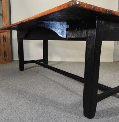 Lot 55 - A 19th century dining table, with a hinged...