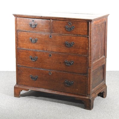 Lot 327 - An 18th century oak chest, in two parts, on...