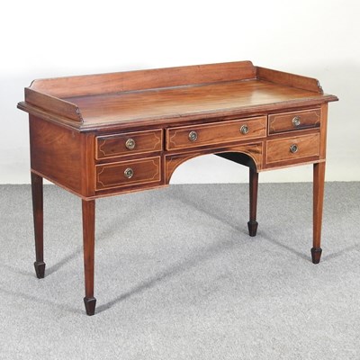 Lot 314 - An Edwardian mahogany washstand, with a...