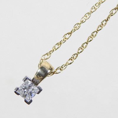 Lot 55 - A 9 carat gold princess cut diamond pendant,...
