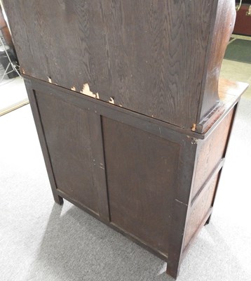 Lot 102 - A mid 20th century carved oak dresser, by...