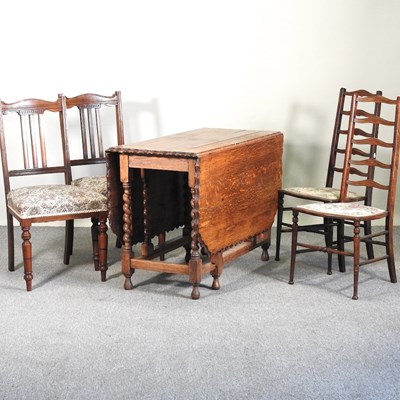 Lot 208 - A 1920's oak gateleg dining table, 106cm,...