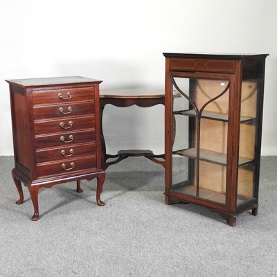Lot 145 - An Edwardian glazed display cabinet, together...