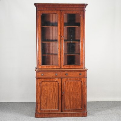 Lot 653 - A Victorian mahogany cabinet bookcase, on a...