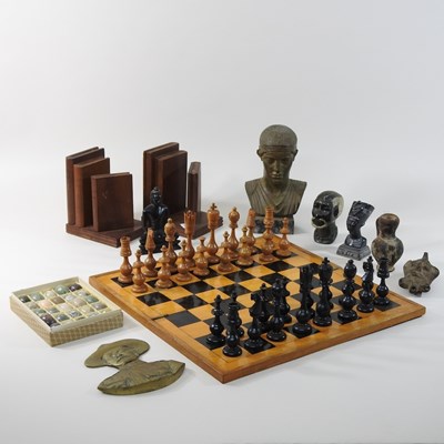 Lot 240 - A wooden chess set