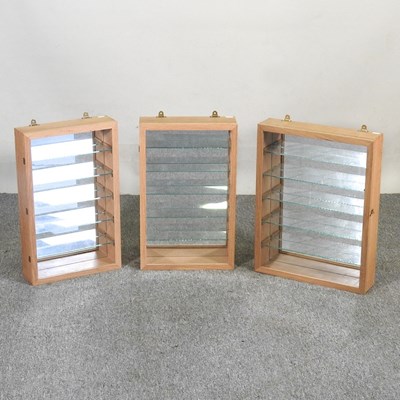 Lot 377 - A pair of modern glazed oak display cases,...