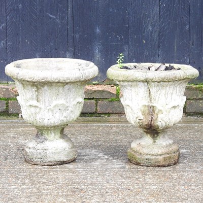 Lot 546 - A pair of cast stone garden urns, 36cm high (2)