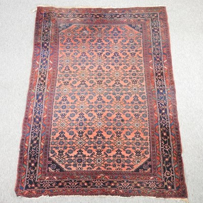 Lot 558 - A Persian rug