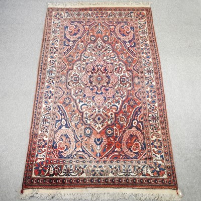 Lot 572 - A Persian rug