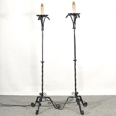Lot 98 - A pair of wrought iron standard lamps, 156cm...