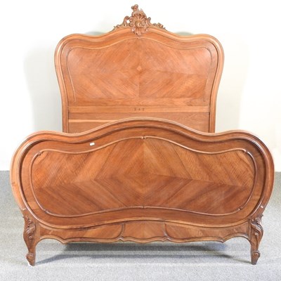 Lot 245 - An early 20th century French walnut double...