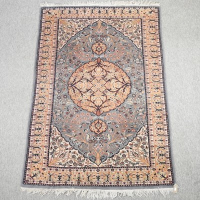 Lot 566 - A Persian woollen rug