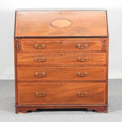 Lot 664 - An Edwardian inlaid bureau, with a fitted...