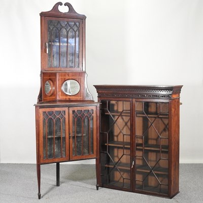 Lot 612 - An Edwardian inlaid standing corner cupboard,...