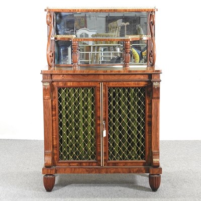 Lot 705 - A Regency walnut chiffonier, with fabric lined...