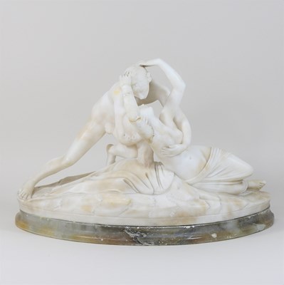 Lot 316 - A carved alabaster figure group of two lovers