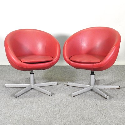 Lot 309 - A pair of contemporary red upholstered swivel...