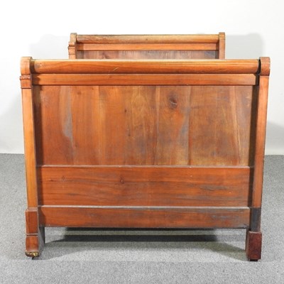 Lot 411 - An early 20th century French fruitwood...