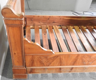 Lot 411 - An early 20th century French fruitwood...