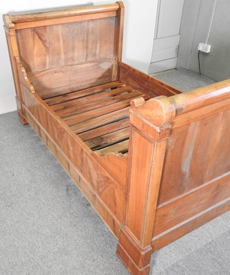 Lot 411 - An early 20th century French fruitwood...