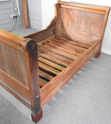 Lot 411 - An early 20th century French fruitwood...